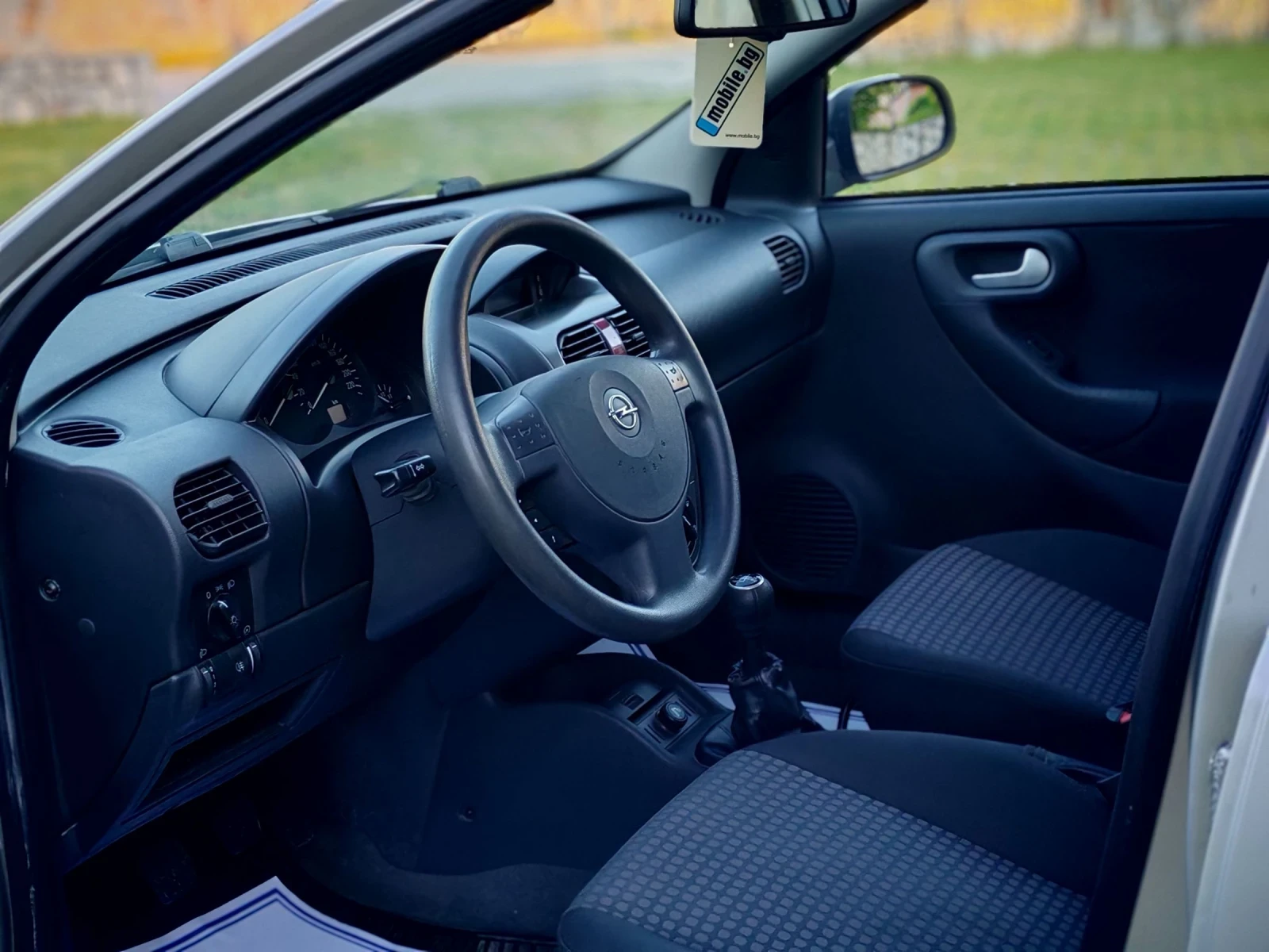 Opel Corsa 1.2I 16V(75)* FACELIFT* КЛИМАТИК* НОВ ВНОС* , снимка 11 - Автомобили и джипове - 54598719