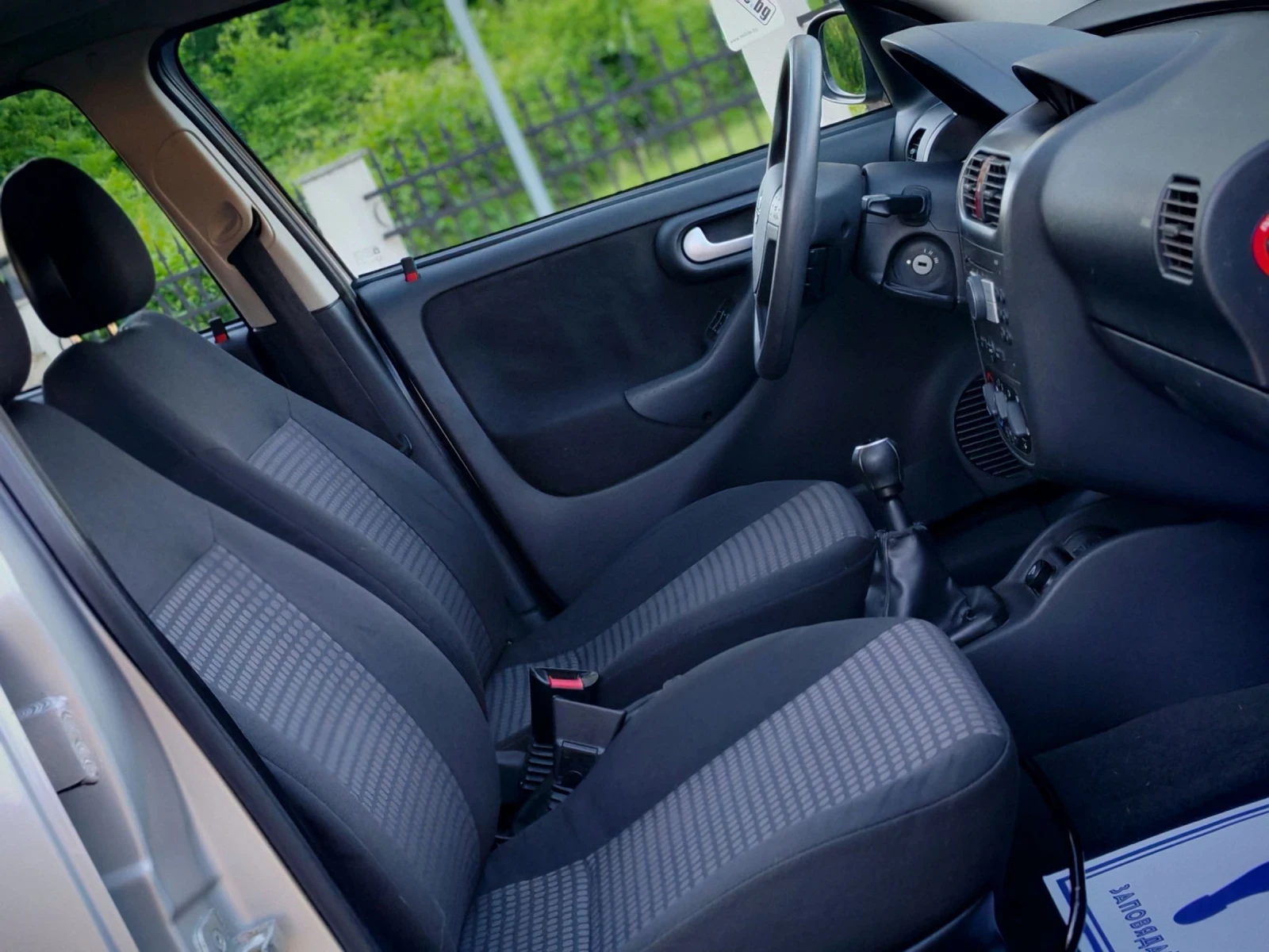 Opel Corsa 1.2I 16V(75)* FACELIFT* КЛИМАТИК* НОВ ВНОС* , снимка 13 - Автомобили и джипове - 54598719