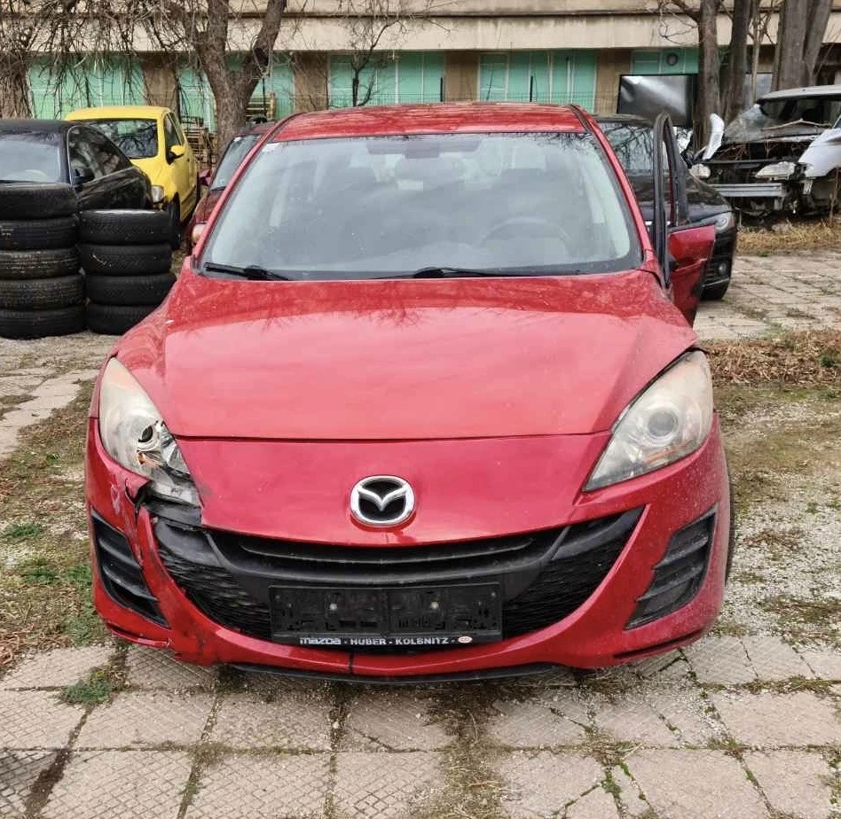 Mazda 3 1.6 i и 2.2 d  - изображение 4