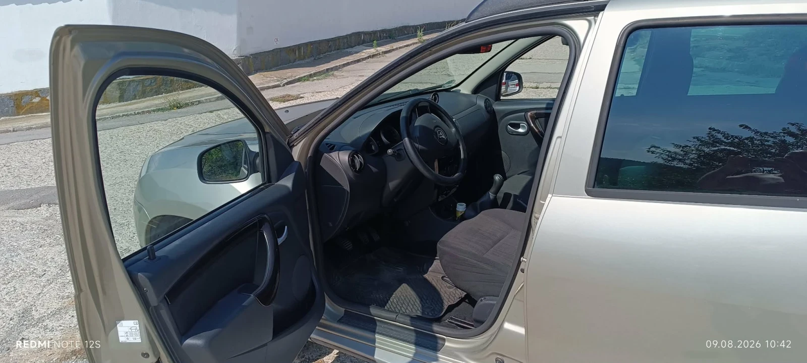 Dacia Duster 1.6, снимка 12 - Автомобили и джипове - 55922712