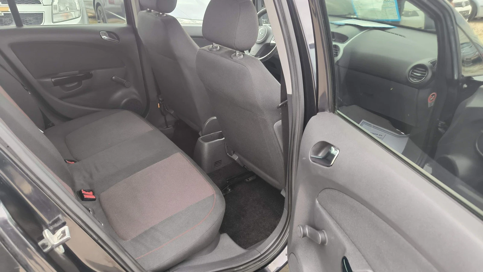 Opel Corsa 1.4i, снимка 10 - Автомобили и джипове - 56477280