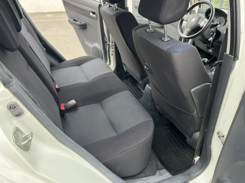 Suzuki Swift 1.3I 90кс 4Х4 EURO 4 KЛИМАТИК, снимка 10 - Автомобили и джипове - 52831076