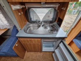 Каравана Burstner Flipper 480TK Швейцария, снимка 13