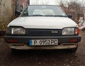 Mazda 323, снимка 1