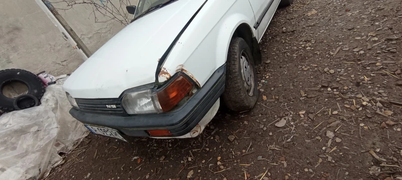 Mazda 323, снимка 6 - Автомобили и джипове - 48960907