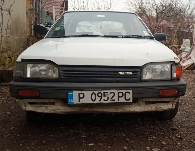 Mazda 323, снимка 1 - Автомобили и джипове - 48960907