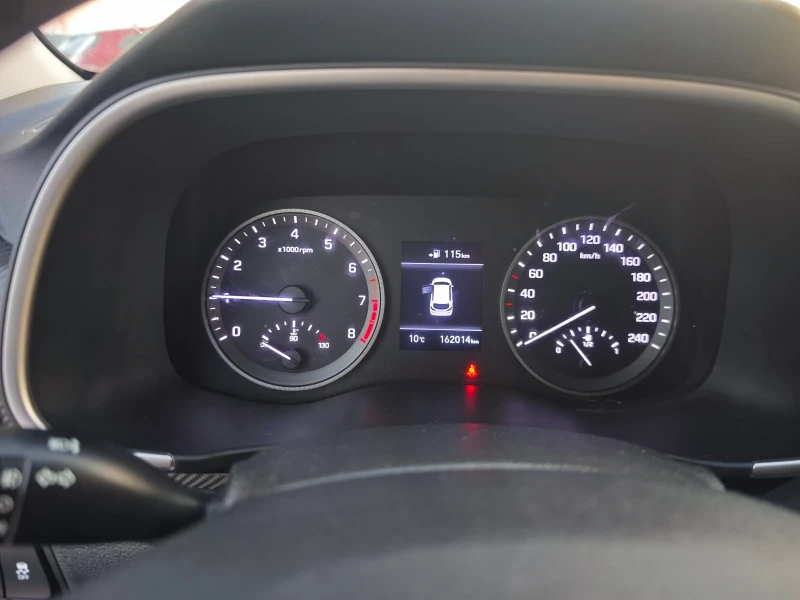 Hyundai Tucson 1.6i 16v , снимка 7 - Автомобили и джипове - 52804548