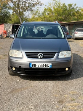 VW Touran 2.0 TDI  - 3499 лв. / 1789.01 € - 35293309 2