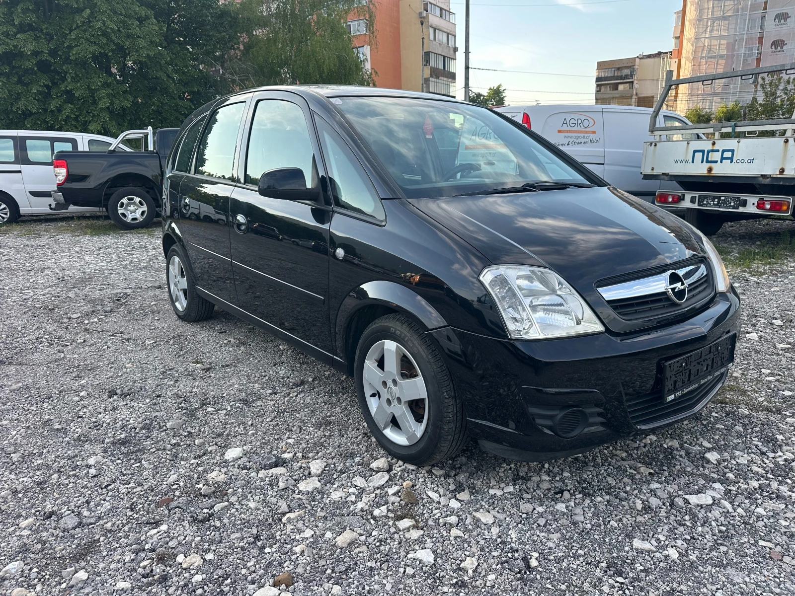 Opel Meriva 1.4i 90kc, снимка 7 - Автомобили и джипове - 54423312