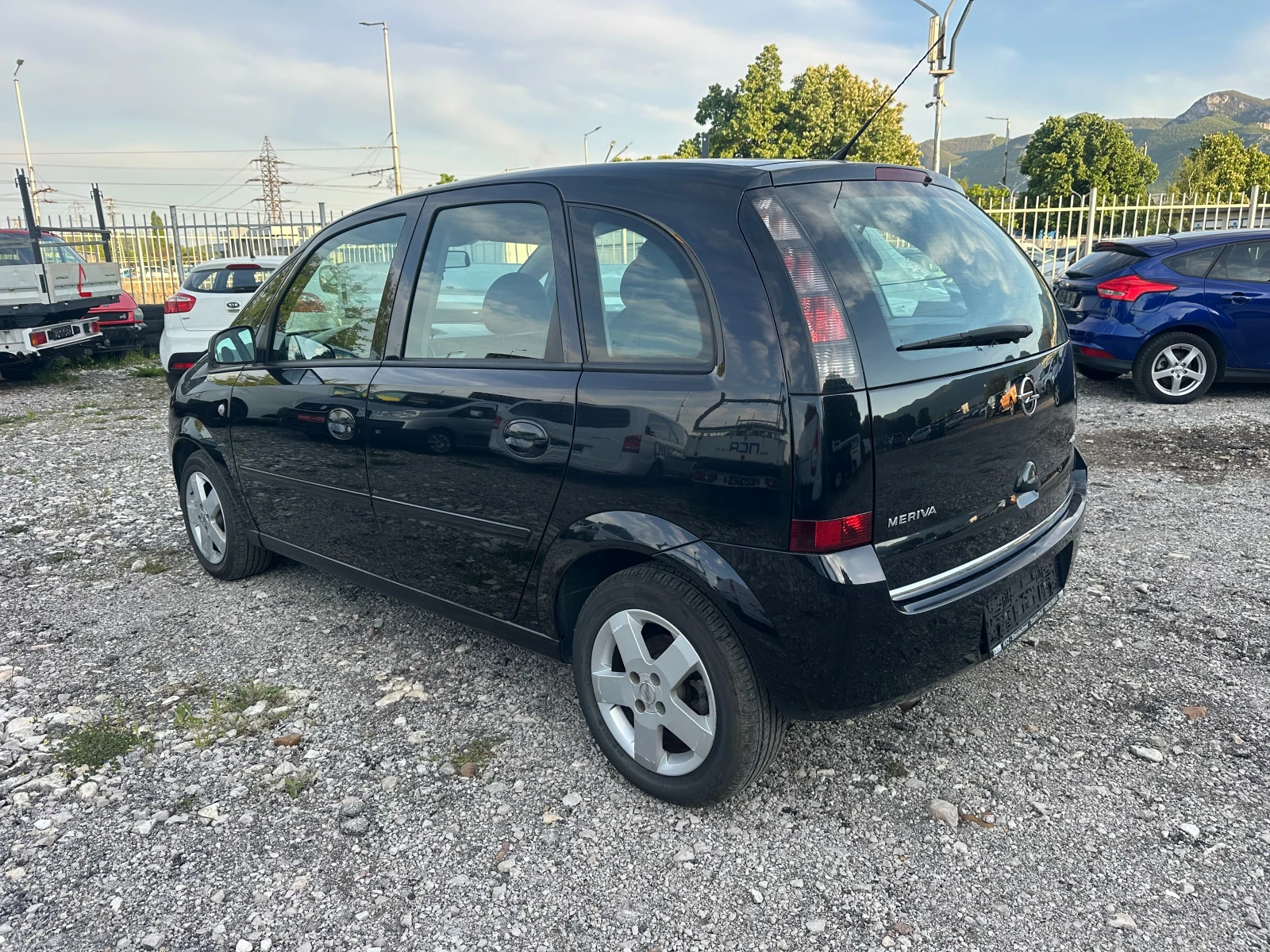 Opel Meriva 1.4i 90kc, снимка 3 - Автомобили и джипове - 54423312