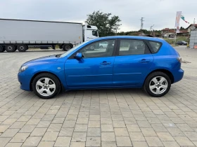 Mazda 3 1.4i, снимка 4