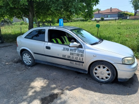 Opel Astra У Ч Е Б Е Н , снимка 1