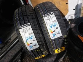 Гуми Зимни 205/60R15, снимка 1 - Гуми и джанти - 42832009