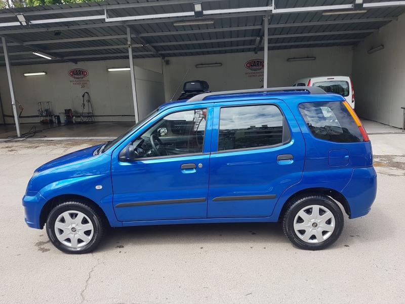 Subaru Justy 1.3i 4X4 TIP -TOP, снимка 2 - Автомобили и джипове - 45336658