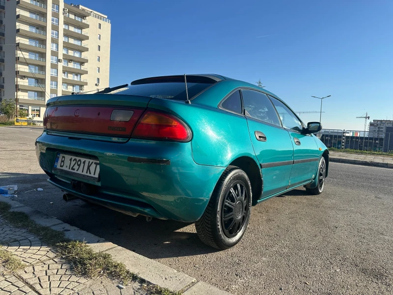 Mazda 323 323f BA, снимка 3 - Автомобили и джипове - 47729787