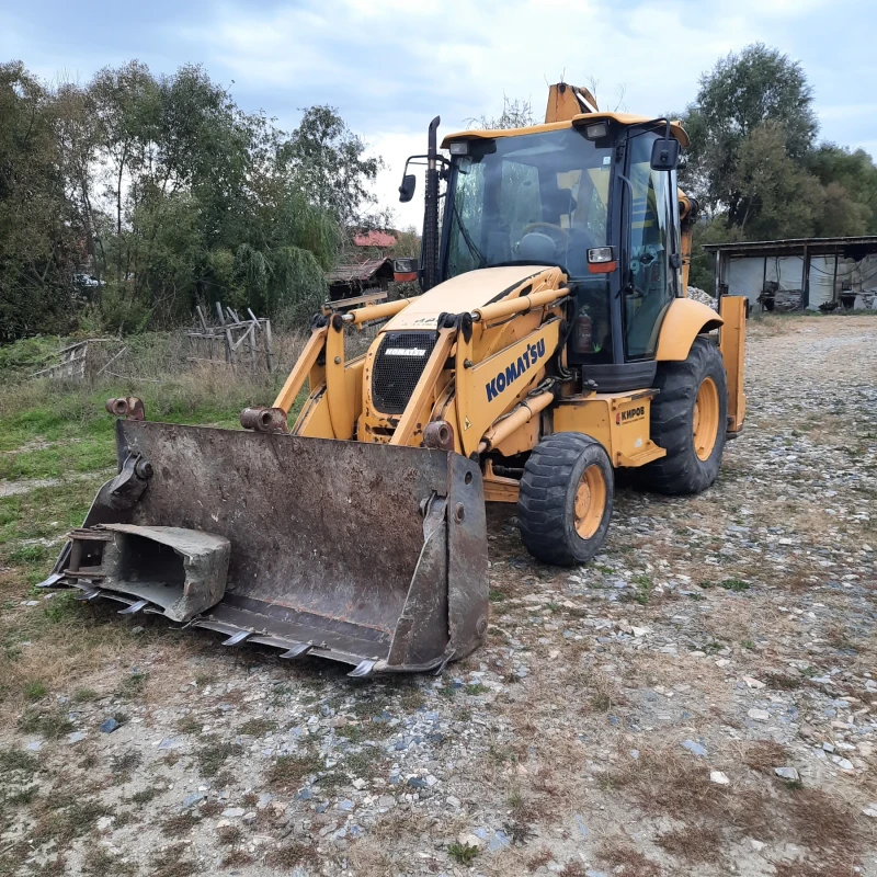 Багер Komatsu Wb91r-5 