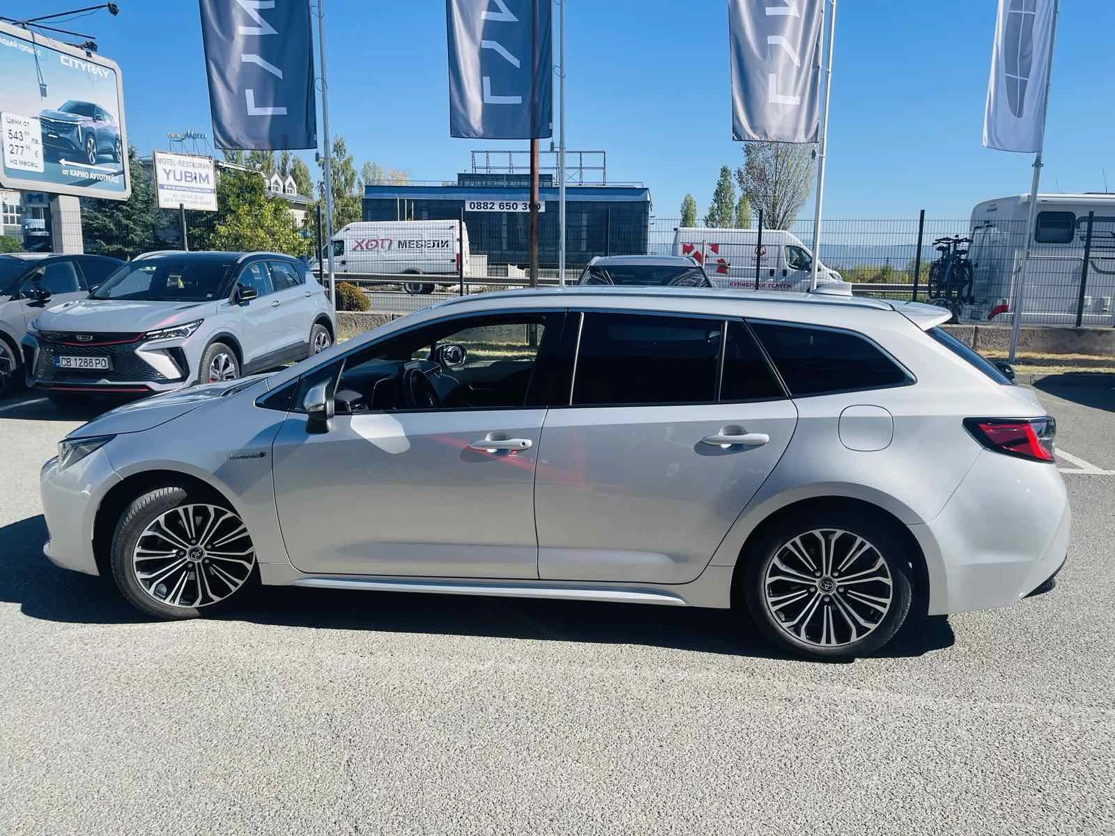 Toyota Corolla 2.0 HEV Touring Sport Executive Plus - изображение 7