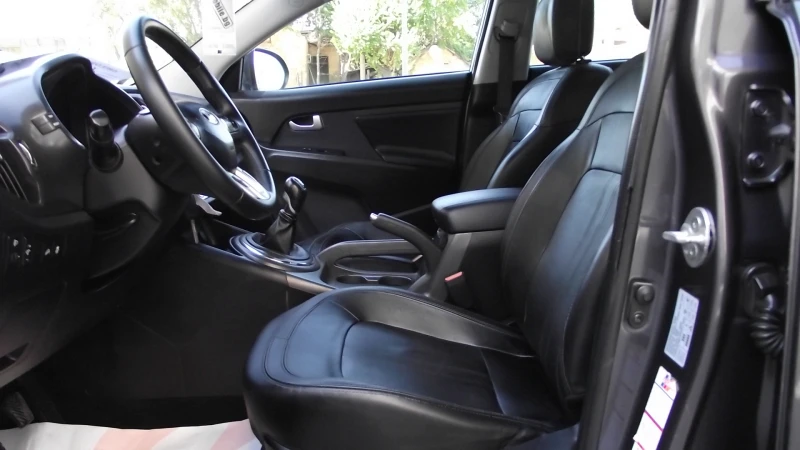 Kia Sportage 1.7.d.116.k.c.КОЖА.FACE., снимка 13 - Автомобили и джипове - 51770358