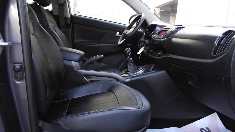 Kia Sportage 1.7.d.116.k.c.КОЖА.FACE., снимка 14 - Автомобили и джипове - 51770358