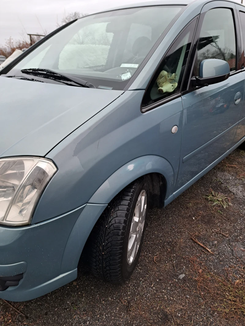 Opel Meriva, снимка 11 - Автомобили и джипове - 48265879