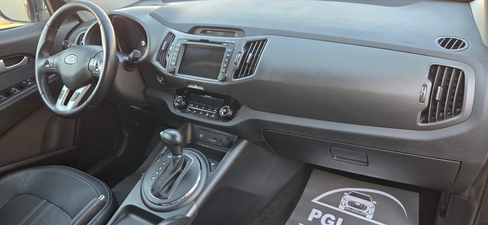 Kia Sportage 2.0I 163к.с/Автомат/Кожа/4х4/Навигация/Панорама, снимка 13 - Автомобили и джипове - 55695868