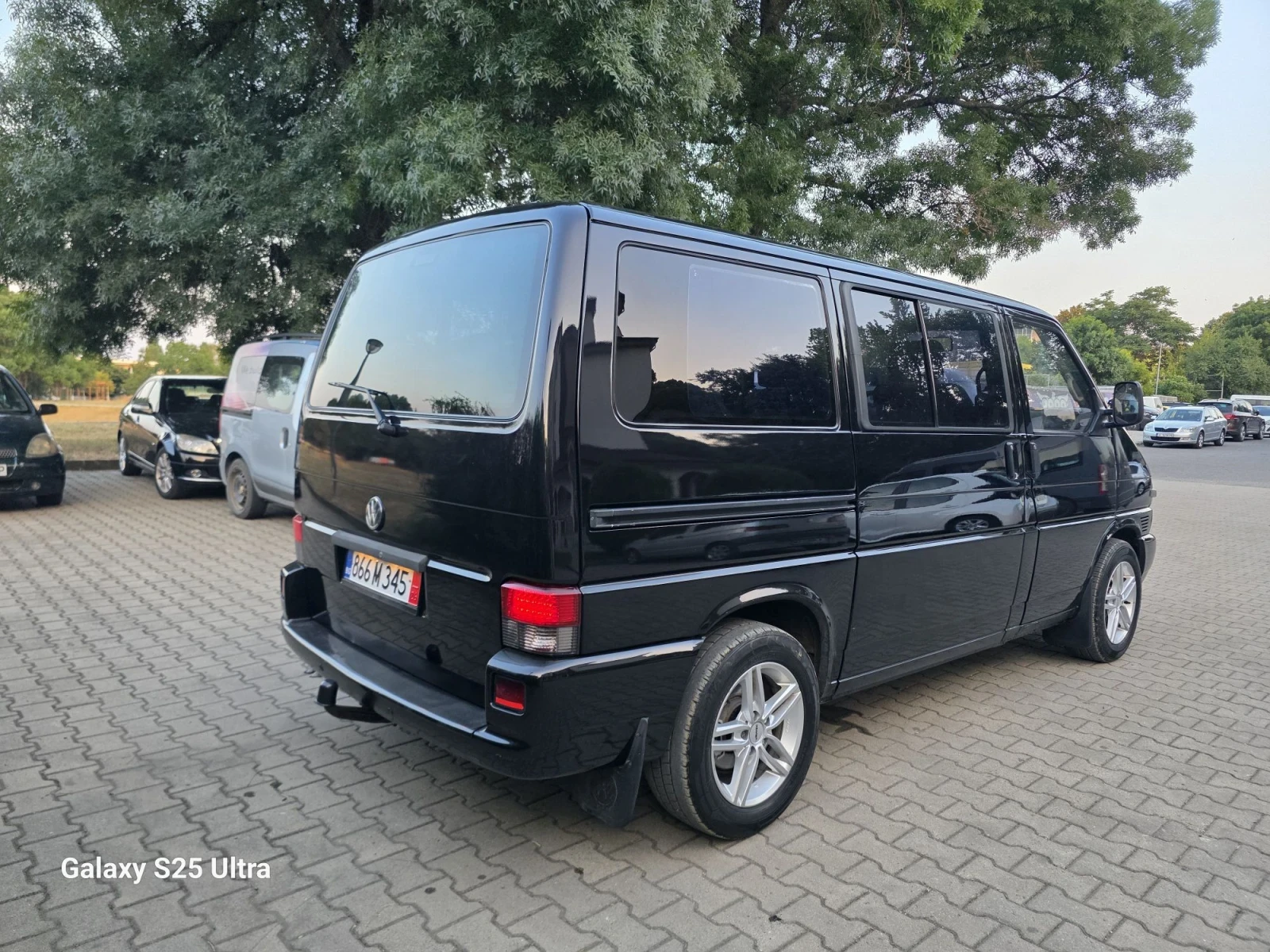 VW Caravelle 2.5 TDI 102ps.двузонов.климатроник, снимка 6 - Бусове и автобуси - 55713640