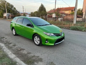 Toyota Auris 1.8 HYBRID, снимка 1