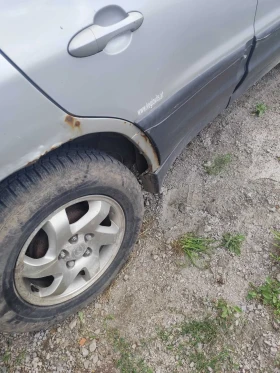 Mazda Tribute 2.0, снимка 3
