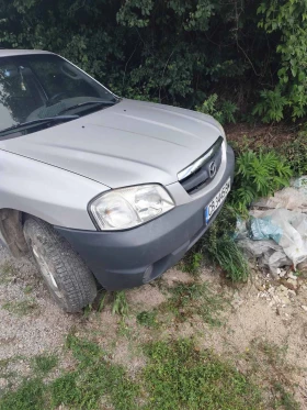 Mazda Tribute 2.0, снимка 1