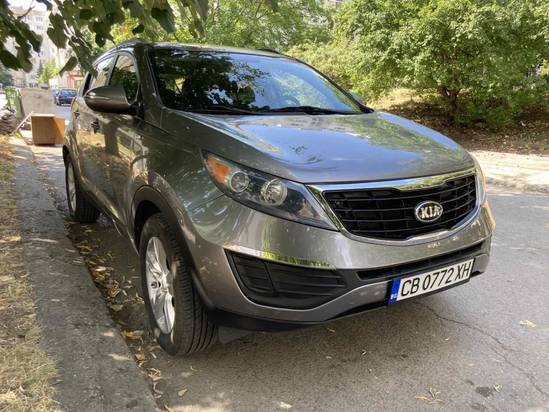 Kia Sportage AWD 2.4MPI Аuto + Газ, снимка 6 - Автомобили и джипове - 53459502