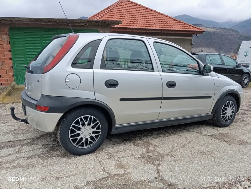 Opel Corsa 1.2i 75 к.с.5 врати , снимка 4 - Автомобили и джипове - 53293574