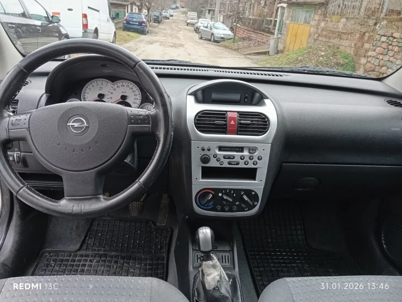 Opel Corsa 1.2i 75 к.с.5 врати , снимка 13 - Автомобили и джипове - 53293574