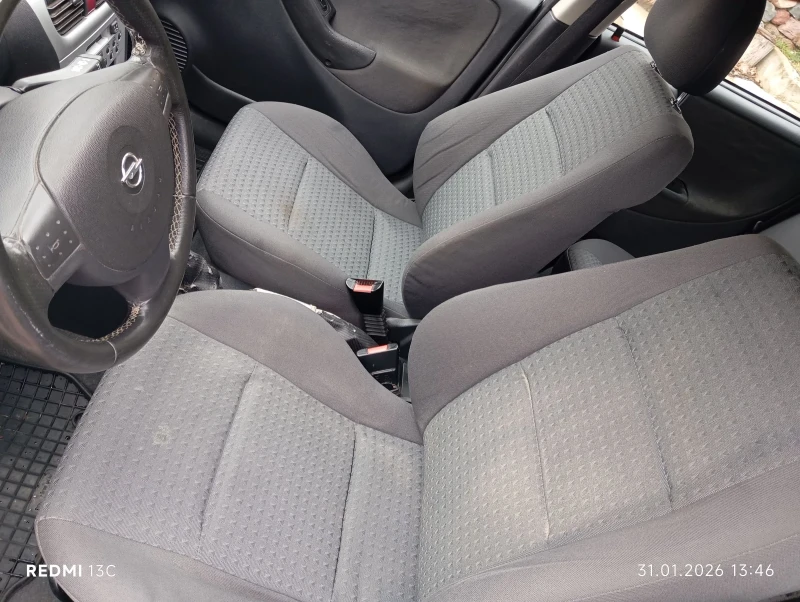 Opel Corsa 1.2i 75 к.с.5 врати , снимка 14 - Автомобили и джипове - 53293574