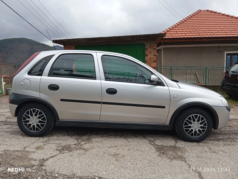 Opel Corsa 1.2i 75 к.с.5 врати , снимка 3 - Автомобили и джипове - 53293574
