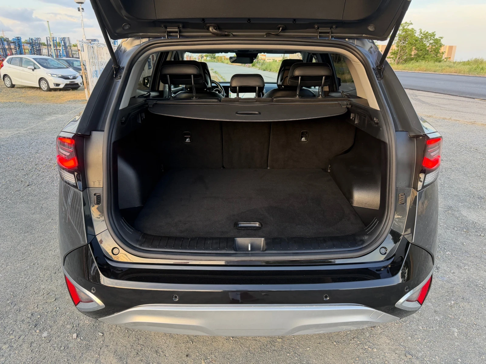 Kia Sportage PHEV / PREMIUM / 4X4 / WAZE / YOUTUBE / 110 000 км, снимка 14 - Автомобили и джипове - 54671878