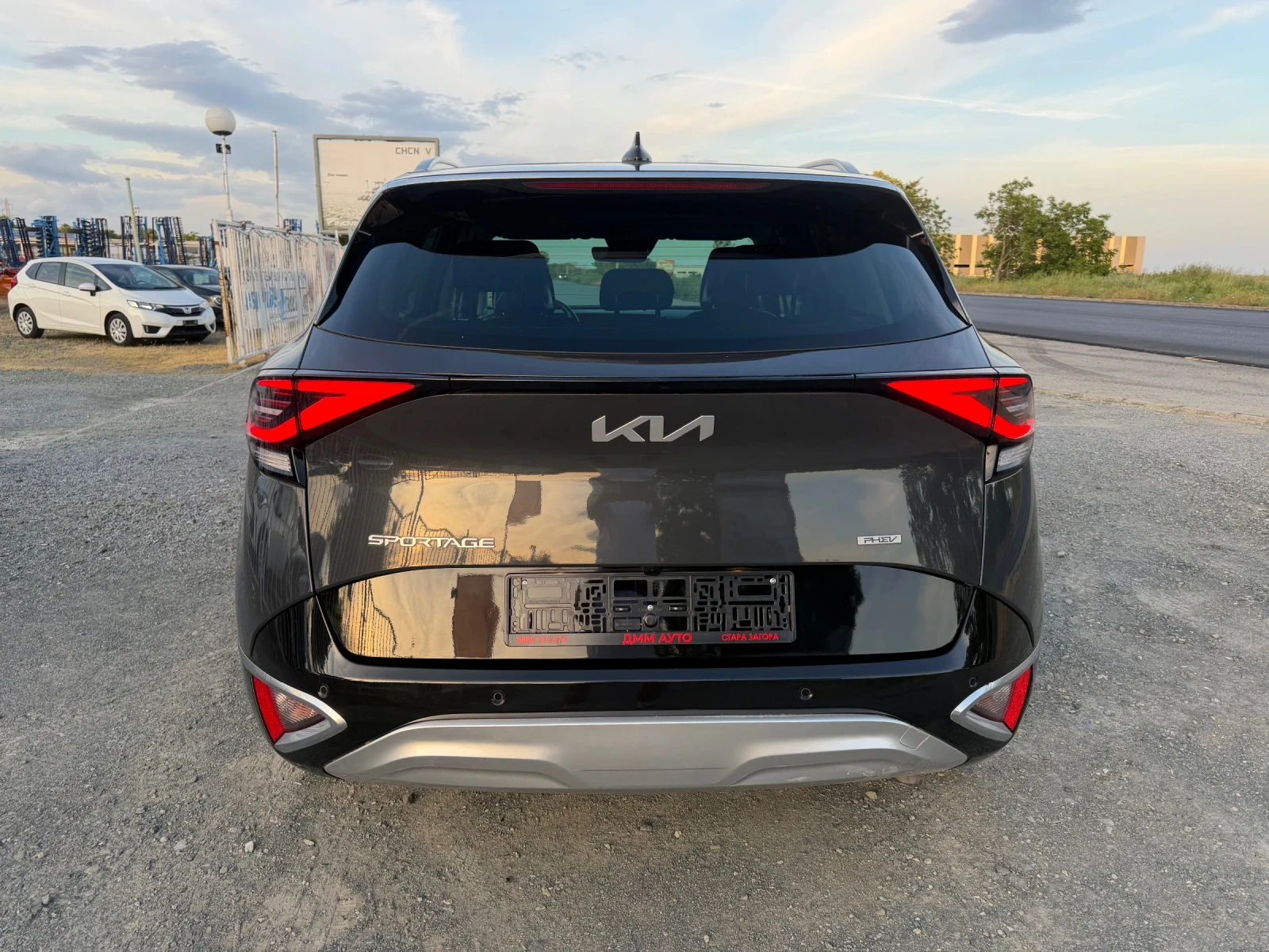 Kia Sportage PHEV / PREMIUM / 4X4 / WAZE / YOUTUBE / 110 000 км, снимка 6 - Автомобили и джипове - 54671878