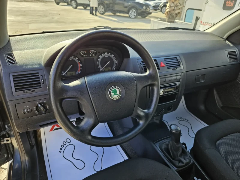 Skoda Fabia 1.4TDI-75КС= КЛИМАТИК, снимка 8 - Автомобили и джипове - 48116683