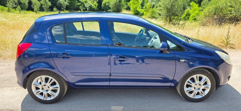 Opel Corsa D 1.2i, снимка 8 - Автомобили и джипове - 50755761