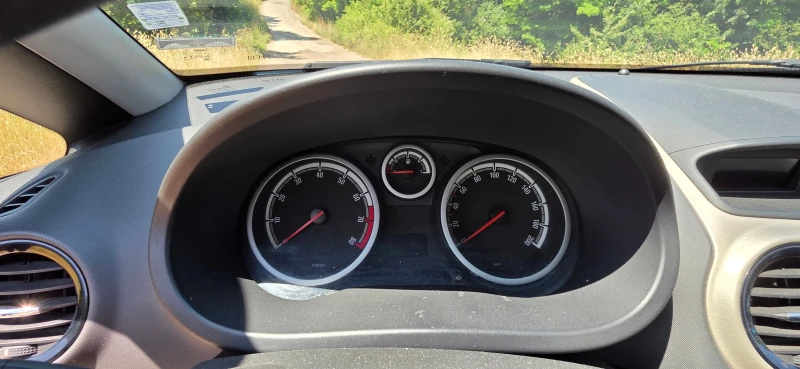 Opel Corsa D 1.2i, снимка 14 - Автомобили и джипове - 50755761