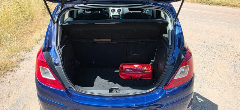 Opel Corsa D 1.2i, снимка 9 - Автомобили и джипове - 50755761