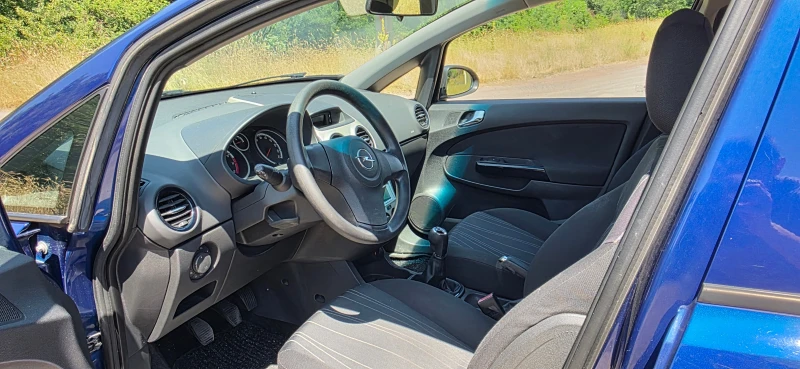 Opel Corsa D 1.2i, снимка 12 - Автомобили и джипове - 50755761