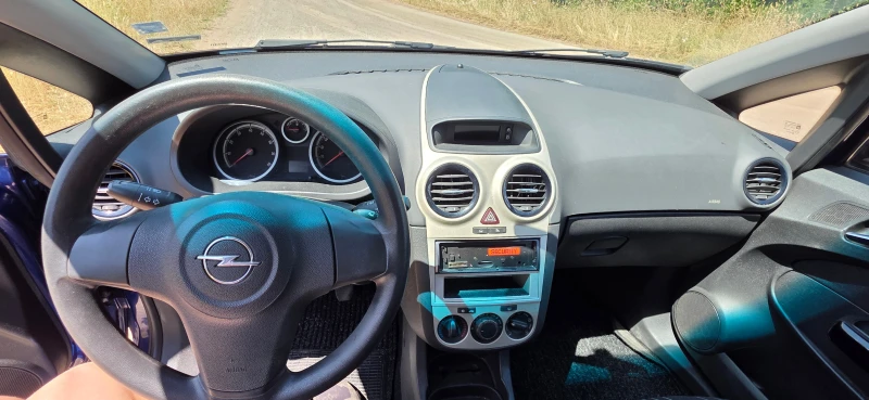 Opel Corsa D 1.2i, снимка 13 - Автомобили и джипове - 50755761