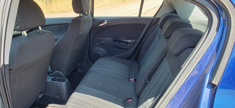 Opel Corsa D 1.2i, снимка 11 - Автомобили и джипове - 50755761