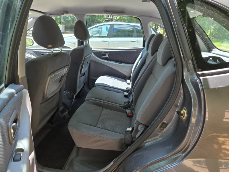 Nissan Almera tino, снимка 6 - Автомобили и джипове - 52032257