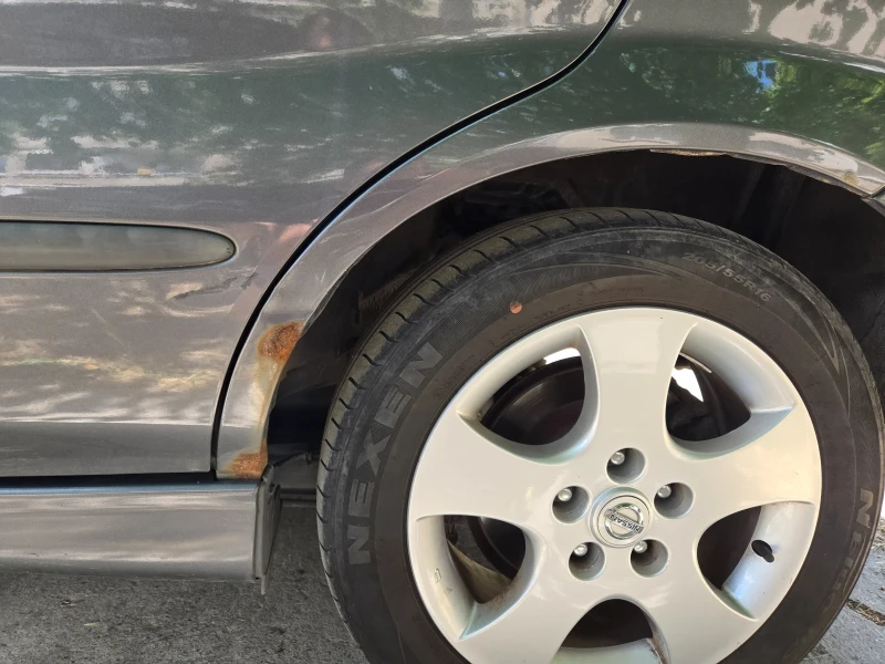 Nissan Almera tino, снимка 15 - Автомобили и джипове - 52032257