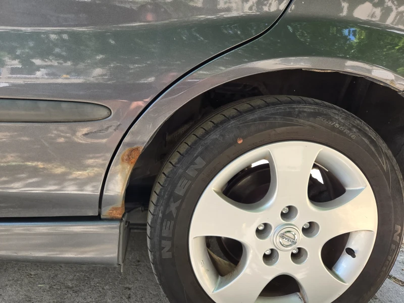 Nissan Almera tino, снимка 16 - Автомобили и джипове - 52032257