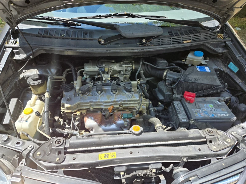 Nissan Almera tino, снимка 17 - Автомобили и джипове - 52032257