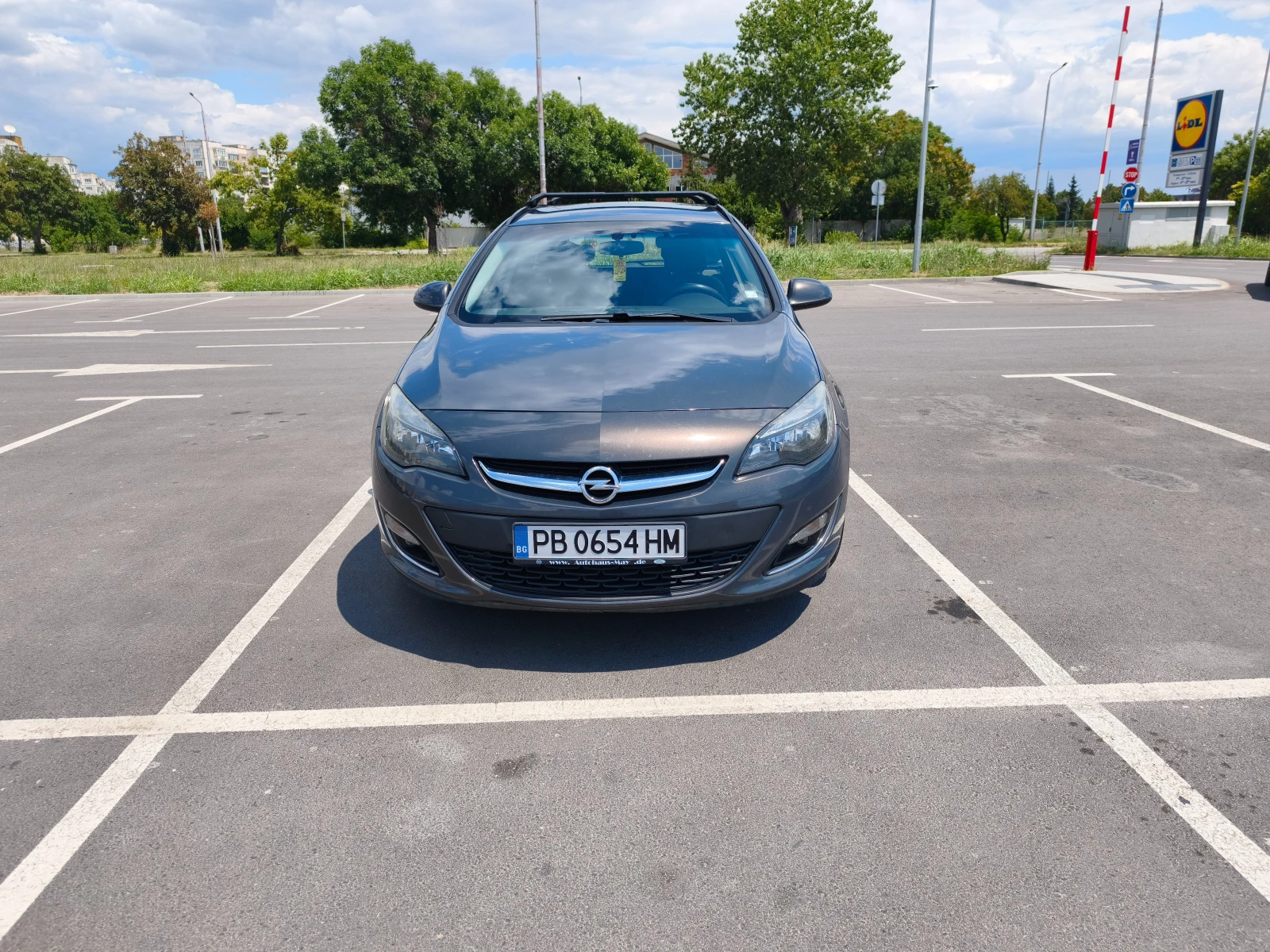 Opel Astra J Sports Tourer, снимка 1 - Автомобили и джипове - 55415603