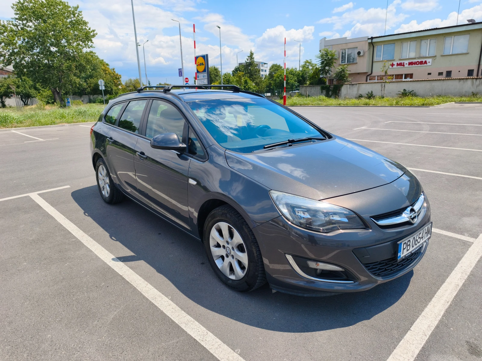 Opel Astra J Sports Tourer, снимка 6 - Автомобили и джипове - 55415603