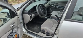 Nissan Almera 1.5 90кс, снимка 3